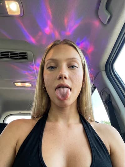NSFW AI Chat: Naughty Ai Girlfriend Blonde Tongue Out Car Selfie