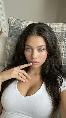 Brunette AI girl taking selfie